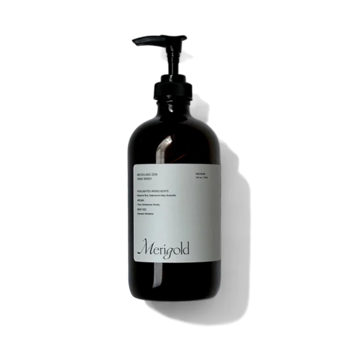 A black bottle with a pump dispenser, labeled 'Mergold'.